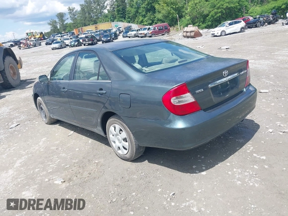 2003 Toyota Camry LE with VIN 4T1BE32K23U785060, listed as a IAAI auction lot 41825336 with 205,751 mi miles and . Bid and sale history available at DreamBid. Image 3.