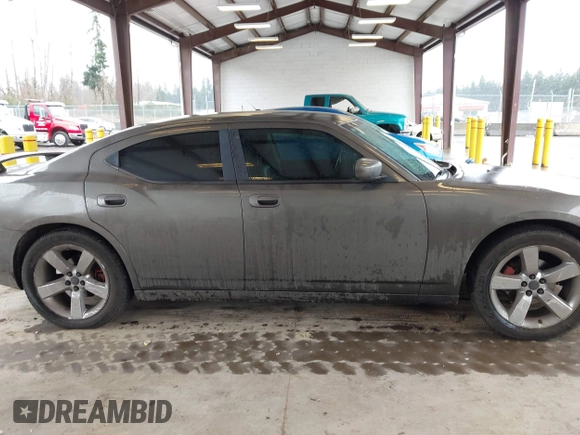 2010 Dodge Charger SXT with VIN 2B3CA3CV1AH250204, listed as a IAAI auction lot 41692787 with 111,757 mi miles. Bid and sale history available at carsss.com. Image 14.
