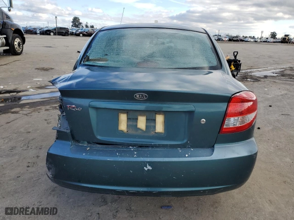 2004 Kia Rio with VIN KNADC125546294695, listed as a Copart auction lot 86914954 with 147,260 mi miles and Salvage Title. Bid and sale history available at carsss.com. Image 6.