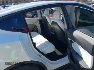 2021 Tesla Model Y Performance with VIN 5YJYGDEF8MF246658, listed as a IAAI auction lot 41679793 with 28,015 mi miles and . Bid and sale history available at DreamBid. Image 8.