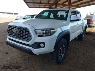 2023 Toyota Tacoma 4WD SR with VIN 3TMCZ5AN8PM650793, listed as a IAAI auction lot 41664712 with 9,427 mi miles. Bid and sale history available at carsss.com. Image 2.