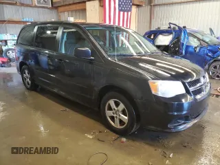 2012 Dodge Grand Caravan SXT with VIN 2C4RDGCG0CR340868, listed as a Copart auction lot 85560274 with 242,089 mi miles and Clean Title. Bid and sale history available at DreamBid. Image 4.