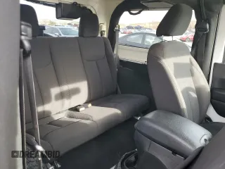2018 Jeep Wrangler Sport S with VIN 1C4AJWAG1JL884708, listed as a Copart auction lot 82643804 with 80,002 mi miles and Salvage title. Bid and sale history available at DreamBid. Image 11.