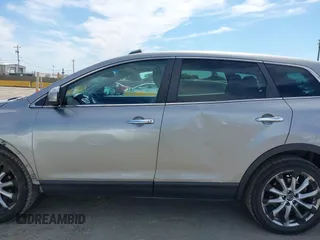 2014 Mazda CX-9 Grand Touring z VIN JM3TB2DVXE0432991, wystawiony jako IAAI lot #42826784 z przebiegiem 134 265 mil mil oraz . Historia ofert i sprzedaży dostępna na DreamBid. Obrazek 14.