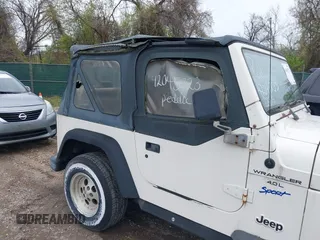 1998 Jeep Wrangler Sport with VIN 1J4FY19S0WP779147, listed as a IAAI auction lot 42045723 with 205,822 mi miles. Bid and sale history available at carsss.com. Image 14.