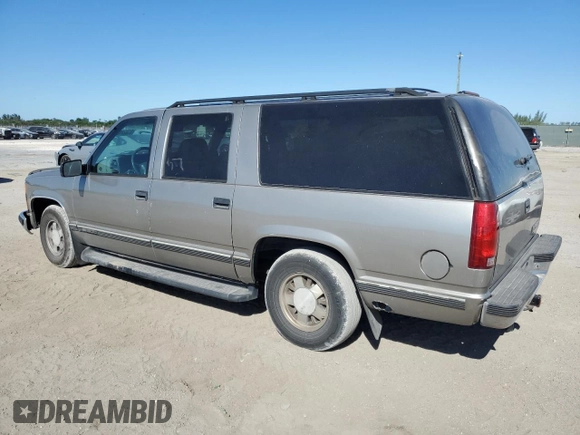 1999 Chevrolet Suburban with VIN 3GNEC16R4XG185031, listed as a Copart auction lot 81824104 with 272,014 mi miles and Salvage Title. Bid and sale history available at carsss.com. Image 2.