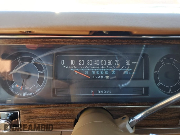 1979 Chevrolet Impala z VIN 1N69G9S303908, wystawiony jako Copart lot #70999004 z przebiegiem 47 489 mil mil oraz Szkoda całkowita • Salvage title. Historia ofert i sprzedaży dostępna na DreamBid. Obrazek 9.