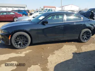 2019 Dodge Charger SXT with VIN 2C3CDXBG9KH580890, listed as a IAAI auction lot 41793008 with 52,497 mi miles. Bid and sale history available at carsss.com. Image 14.