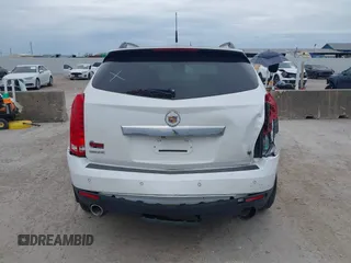 2012 Cadillac SRX Premium Collection with VIN 3GYFNCE32CS579256, listed as a IAAI auction lot 42660666 with 125,236 mi miles and . Bid and sale history available at DreamBid. Image 6.