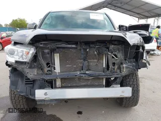 2022 Toyota Tacoma SR with VIN 3TYSX5EN8NT016817, listed as a IAAI auction lot 42140136 with 52,825 mi miles and . Bid and sale history available at DreamBid. Image 6.