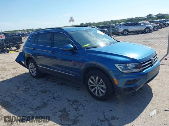 2018 Volkswagen Tiguan SEL z VIN 3VV3B7AX2JM155306, wystawiony jako IAAI lot #42457735 z przebiegiem 48 061 mil mil oraz . Historia ofert i sprzedaży dostępna na DreamBid. Obrazek 1.