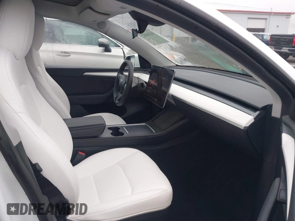 2023 Tesla Model Y Performance z VIN 7SAYGDEF2PF917295, wystawiony jako IAAI lot #41260852 z przebiegiem 23 295 mil mil oraz . Historia ofert i sprzedaży dostępna na DreamBid. Obrazek 5.