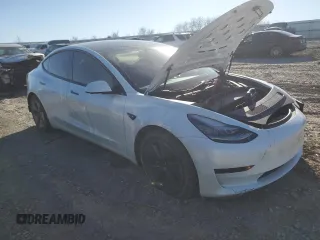 2021 Tesla Model 3 Standard Range Plus with VIN 5YJ3E1EA8MF852089, listed as a Copart auction lot 46157845 with 82,979 mi miles and Salvage Title. Bid and sale history available at DreamBid. Image 4.
