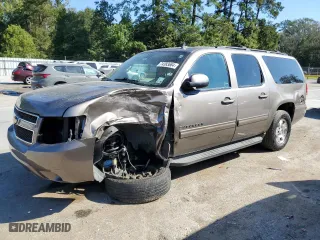2014 Chevrolet Suburban LS with VIN 1GNSCHE0XER193582, listed as a Copart auction lot 74383684 with 147,840 mi miles and Salvage Title. Bid and sale history available at carsss.com. Image 1.