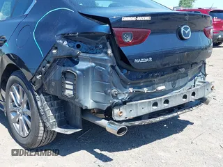 2021 Mazda 3 S with VIN JM1BPAALXM1341814, listed as a IAAI auction lot 42797513 with 32,167 mi miles and . Bid and sale history available at DreamBid. Image 6.
