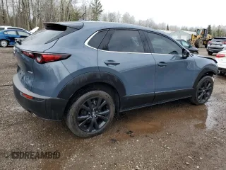2023 Mazda CX-30 S Premium z VIN 3MVDMBDM5PM538276, wystawiony jako Copart lot #54654615 z przebiegiem 35 629 mil mil oraz Szkoda całkowita • Salvage title. Historia ofert i sprzedaży dostępna na DreamBid. Obrazek 3.