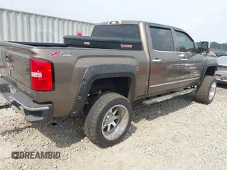 2014 GMC Sierra 1500 SLT with VIN 3GTP1VEC4EG481756, listed as a IAAI auction lot 42069423 with 187,147 mi miles and . Bid and sale history available at DreamBid. Image 4.