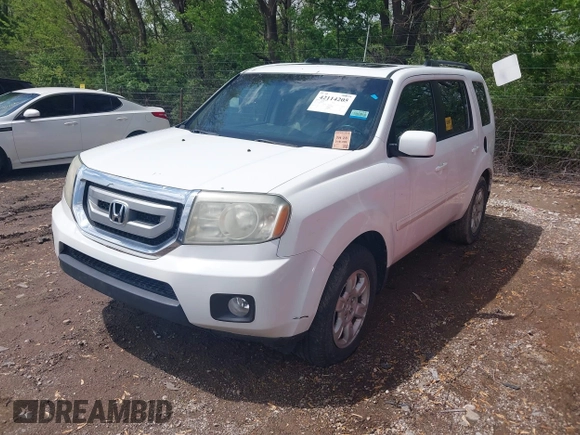 2011 Honda Pilot EX-L with VIN 5FNYF4H58BB085635, listed as a IAAI auction lot 42114205 with 218,399 mi miles. Bid and sale history available at carsss.com. Image 2.