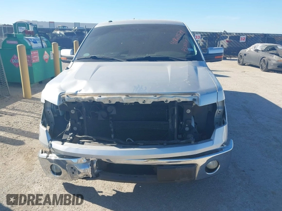 2012 Ford F-150 XL with VIN 1FTFW1CFXCFA19719, listed as a IAAI auction lot 41862574 with 144,425 mi miles. Bid and sale history available at carsss.com. Image 13.