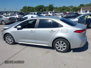 2023 Toyota Corolla LE with VIN 5YFB4MDE8PP053698, listed as a IAAI auction lot 42052631 with 26,766 mi miles. Bid and sale history available at carsss.com. Image 14.