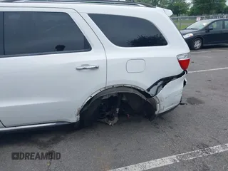 2013 Dodge Durango Crew with VIN 1C4RDJDG4DC518156, listed as a IAAI auction lot 42516880 with 162,402 mi miles and . Bid and sale history available at DreamBid. Image 6.