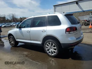 2010 Volkswagen Touareg VR6 with VIN WVGBF7A97AD004355, listed as a Copart auction lot 52861335 with 129,454 mi miles and Salvage Title. Bid and sale history available at DreamBid. Image 2.
