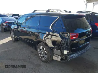 2021 Kia Sedona EX with VIN KNDMC5C10M6671729, listed as a IAAI auction lot 40858206 with 58,775 mi miles. Bid and sale history available at carsss.com. Image 3.