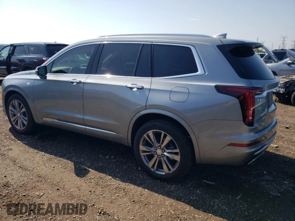 2024 Cadillac XT6 FWD Premium Luxury with VIN 1GYKPCRS7RZ736818, listed as a Copart auction lot 67768804 with 7,145 mi miles and Salvage Title. Bid and sale history available at carsss.com. Image 2.