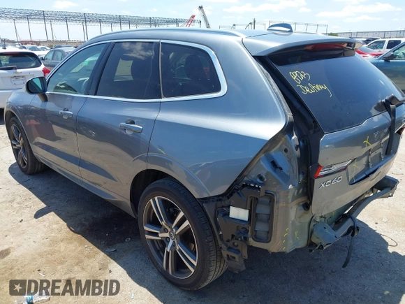 2019 Volvo XC60 Momentum with VIN LYV102DKXKB224961, listed as a IAAI auction lot 42377394 with 71,234 mi miles and . Bid and sale history available at DreamBid. Image 3.