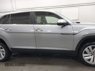 2023 Volkswagen Atlas SE z VIN 1V2KC2CA6PC210593, wystawiony jako IAAI lot #41957633 z przebiegiem 34 801 mil mil oraz . Historia ofert i sprzedaży dostępna na DreamBid. Obrazek 14.