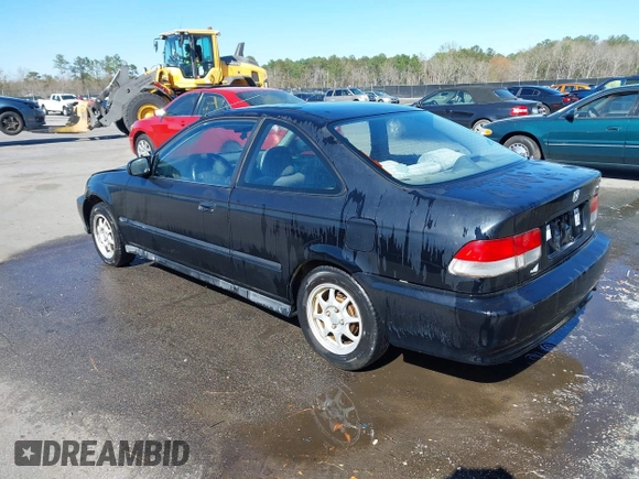 1999 Honda Civic HX with VIN 1HGEJ7123XL068508, listed as a IAAI auction lot 41803733 with 191,412 mi miles. Bid and sale history available at carsss.com. Image 3.