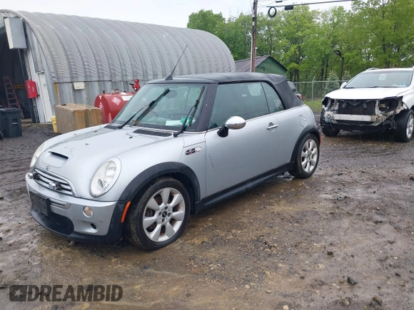 2006 MINI Convertible S with VIN WMWRH33586TF88407, listed as a IAAI auction lot 42223156 with 199,948 mi miles and . Bid and sale history available at DreamBid. Image 2.