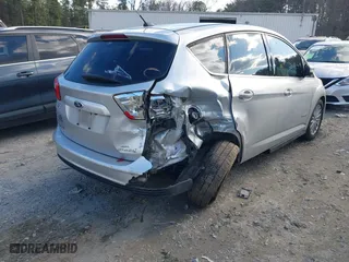 2013 Ford C-Max Hybrid SEL with VIN 1FADP5BU8DL520712, listed as a IAAI auction lot 41158589 with 175,025 mi miles. Bid and sale history available at carsss.com. Image 4.