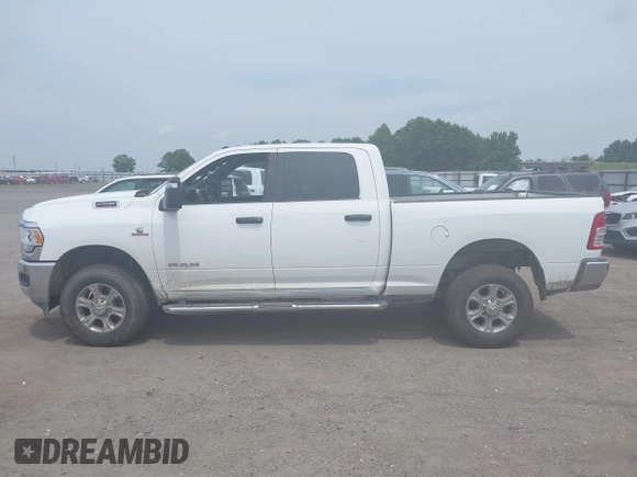 2023 Ram 2500 Big Horn with VIN 3C6UR5DL4PG651105, listed as a IAAI auction lot 42397597 with 53,829 mi miles and . Bid and sale history available at DreamBid. Image 14.