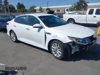 2018 Kia Optima LX z VIN 5XXGT4L35JG265371, wystawiony jako IAAI lot #42494354 z przebiegiem 86 411 mil mil oraz . Historia ofert i sprzedaży dostępna na DreamBid. Obrazek 1.