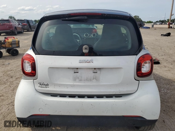 2016 Smart fortwo Passion with VIN WMEFJ5DA2GK140588, listed as a Copart auction lot 57504315 with 59,145 mi miles and Salvage title. Bid and sale history available at DreamBid. Image 6.