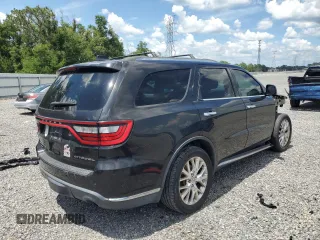 2014 Dodge Durango Citadel with VIN 1C4SDJET1EC349261, listed as a Copart auction lot 61129465 with 201,451 mi miles and Salvage title. Bid and sale history available at DreamBid. Image 3.