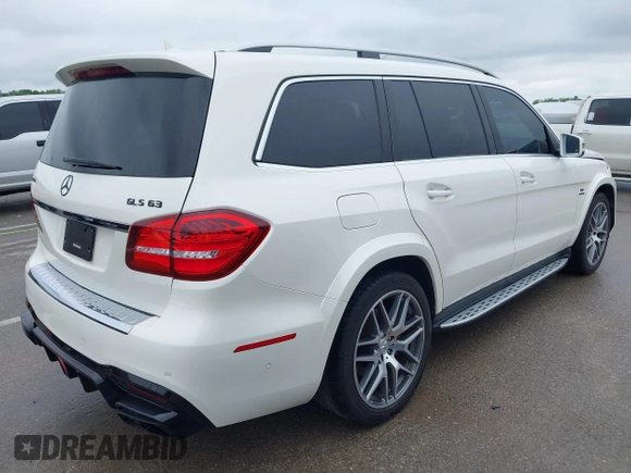 2018 Mercedes-Benz GLS 63 AMG with VIN 4JGDF7FE1JB099084, listed as a IAAI auction lot 42220385 with 97,904 mi miles and . Bid and sale history available at DreamBid. Image 4.