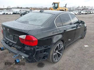 2008 BMW 3 Series 335xi with VIN WBAVD53598A009670, listed as a IAAI auction lot 38985826 with 999,999 mi miles. Bid and sale history available at carsss.com. Image 4.