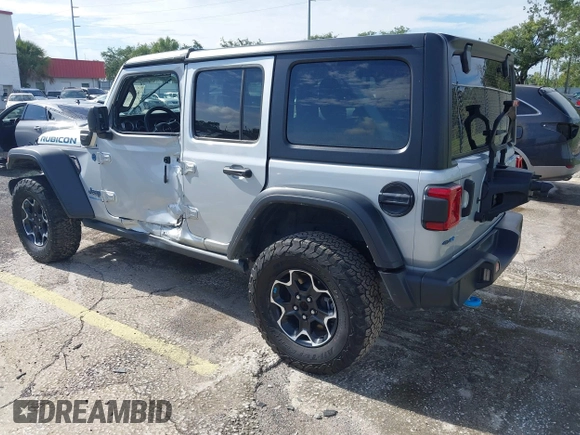2023 Jeep Wrangler Rubicon with VIN 1C4JJXR63PW703424, listed as a IAAI auction lot 42639653 with 46,412 mi miles and . Bid and sale history available at DreamBid. Image 3.