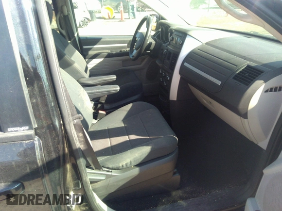 2009 Dodge Grand Caravan SXT z VIN 2D8HN54169R539294, wystawiony jako IAAI lot #41804315 z przebiegiem 175 090 mil mil oraz . Historia ofert i sprzedaży dostępna na DreamBid. Obrazek 5.