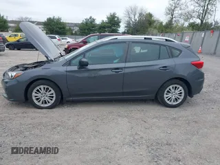 2018 Subaru Impreza Premium z VIN 4S3GTAD61J3703780, wystawiony jako IAAI lot #42081604 z przebiegiem 79 757 mil mil oraz . Historia ofert i sprzedaży dostępna na DreamBid. Obrazek 14.