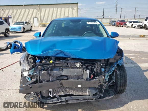 2023 Kia Rio LX z VIN 3KPA24AD2PE597810, wystawiony jako Copart lot #53565235 z przebiegiem 6 836 mil mil oraz Szkoda całkowita • Salvage title. Historia ofert i sprzedaży dostępna na DreamBid. Obrazek 5.