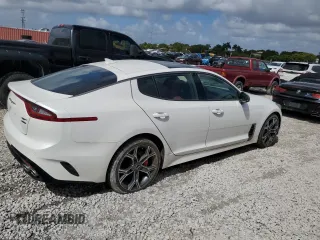 2021 Kia Stinger GT1 with VIN KNAE45LC9M6090262, listed as a Copart auction lot 77339854 with 3,354 mi miles and Salvage Title. Bid and sale history available at carsss.com. Image 3.