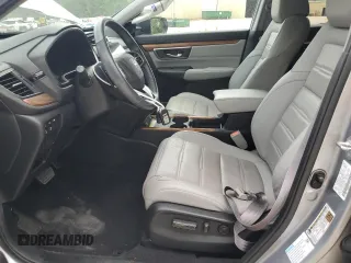2020 Honda CR-V Touring z VIN 7FART6H94LE013557, wystawiony jako Copart lot #54605755 z przebiegiem 42 554 mil mil oraz Szkoda całkowita • Salvage title. Historia ofert i sprzedaży dostępna na DreamBid. Obrazek 7.