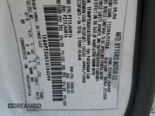 2005 Ford Taurus SE z VIN 1FAHP53U65A184099, wystawiony jako Copart lot #60960015 z przebiegiem Nie podano mil oraz Szkoda całkowita • Salvage title. Historia ofert i sprzedaży dostępna na DreamBid. Obrazek 12.