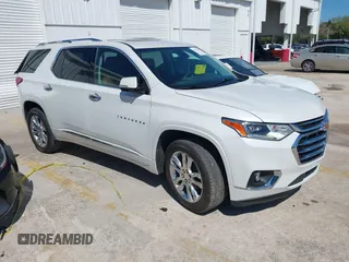 2020 Chevrolet Traverse High Country with VIN 1GNERNKW8LJ282405, listed as a IAAI auction lot 41732859 with 81,321 mi miles and . Bid and sale history available at DreamBid. Image 1.