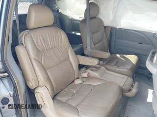 2006 Honda Odyssey EX-L with VIN 5FNRL38716B103035, listed as a IAAI auction lot 42092668 with 264,431 mi miles and . Bid and sale history available at DreamBid. Image 8.