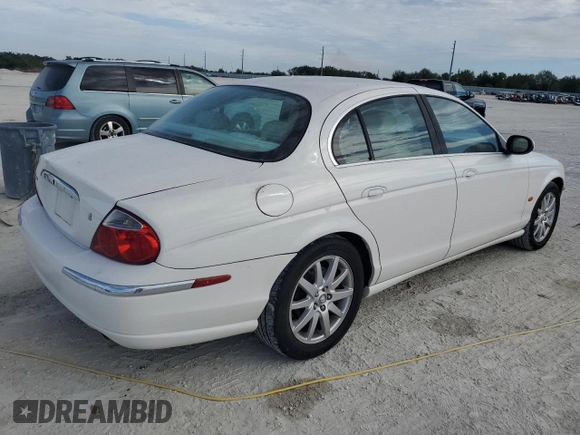2003 Jaguar S-Type z VIN SAJEA01UX3HM59287, wystawiony jako Copart lot #85619554 z przebiegiem 182 851 mil mil oraz Tytuł czysty. Historia ofert i sprzedaży dostępna na DreamBid. Obrazek 3.