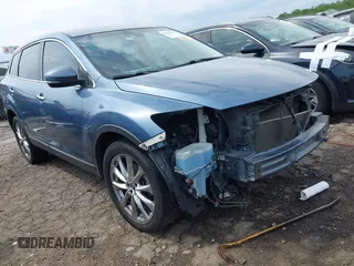 2014 Mazda CX-9 Grand Touring z VIN JM3TB2DA7E0427423, wystawiony jako IAAI lot #42006817 z przebiegiem 95 248 mil mil oraz . Historia ofert i sprzedaży dostępna na DreamBid. Obrazek 1.